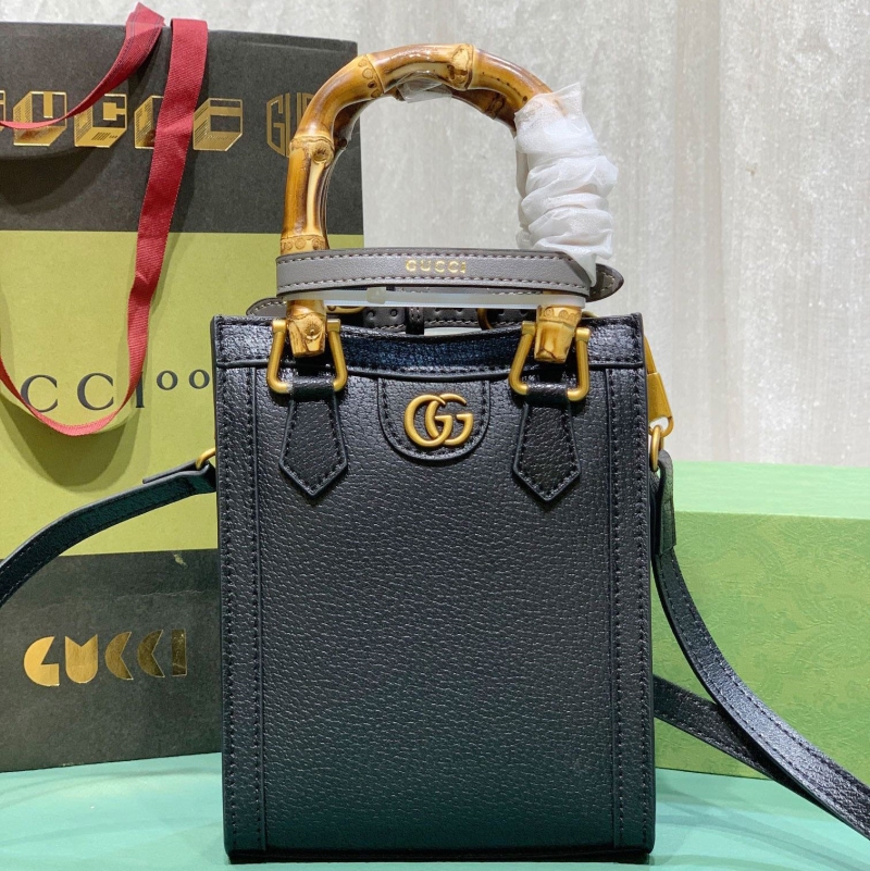G*u*i top handle bags